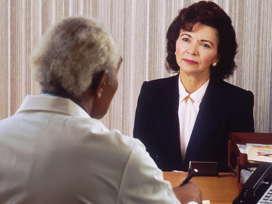 African hospitality staff welcoming guests at a hotel desk